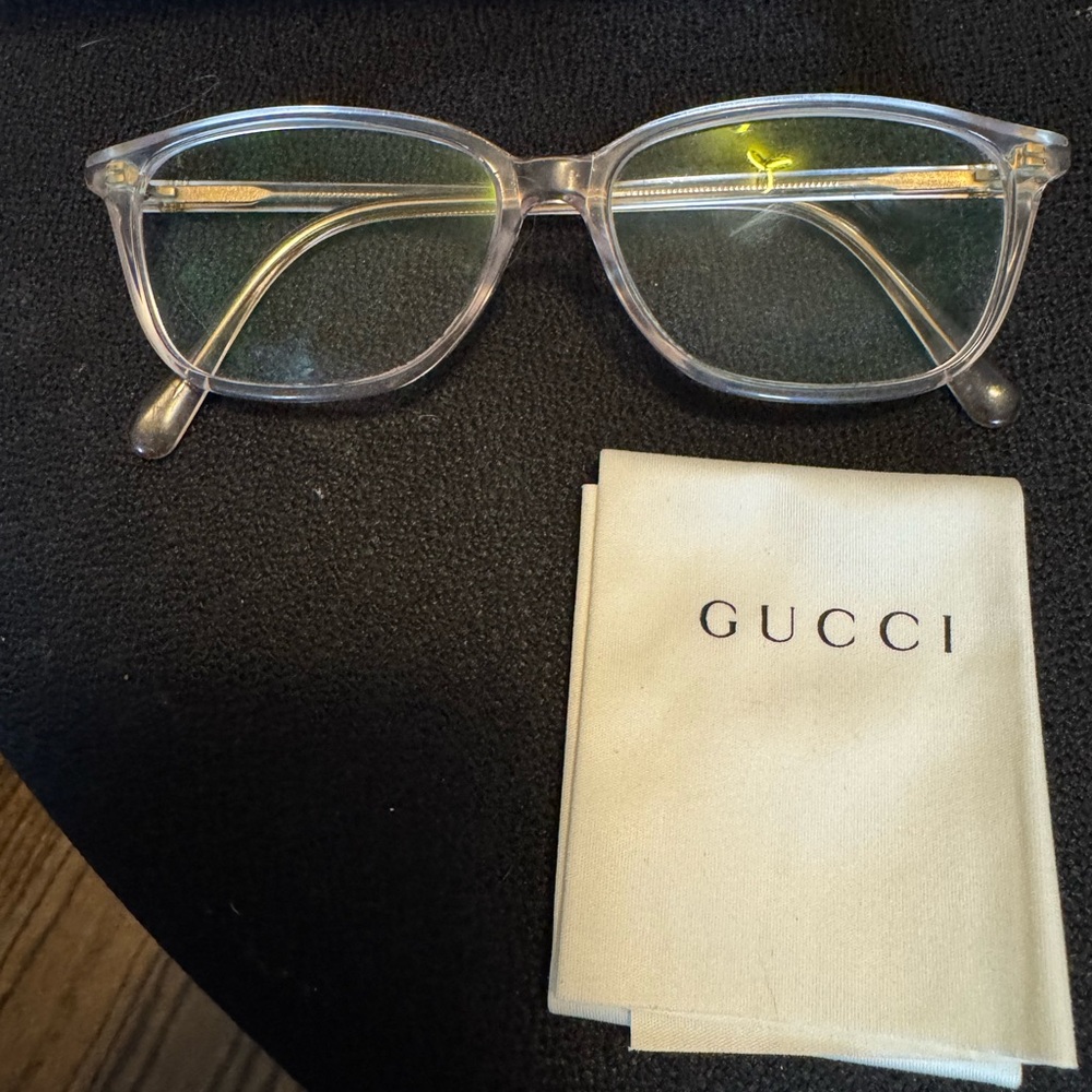 Gucci Transparent Glasses with Gold Accents